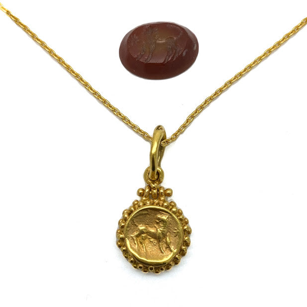 Impression of lion image from an ancient Roman stone steal cast in 18K yellow gold with mock granulation
