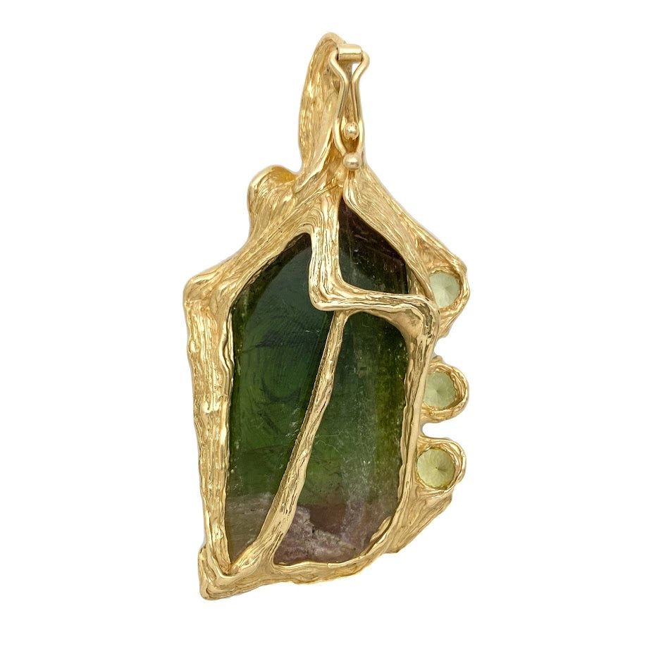 A Hand Carved Female Face into a Tourmaline