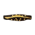 12 diamonds set in 22K gold bezels and randomly scattered on either side of a sculpted 22K line set in the center of an old African wrought iron medicine bracelet