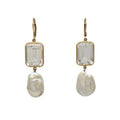 Baroque freshwater pearl with light blue topaz