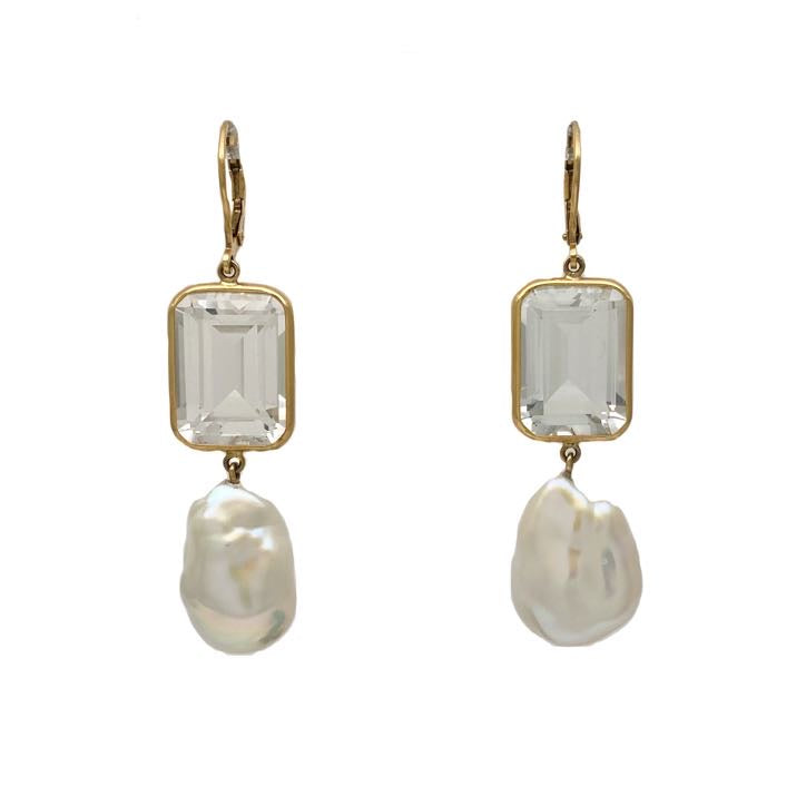 Baroque freshwater pearl with light blue topaz