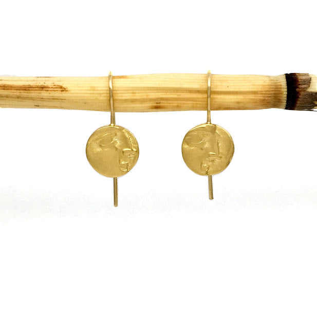 Profile of Athena taken from an ancient Greek coin, circa 300BCE