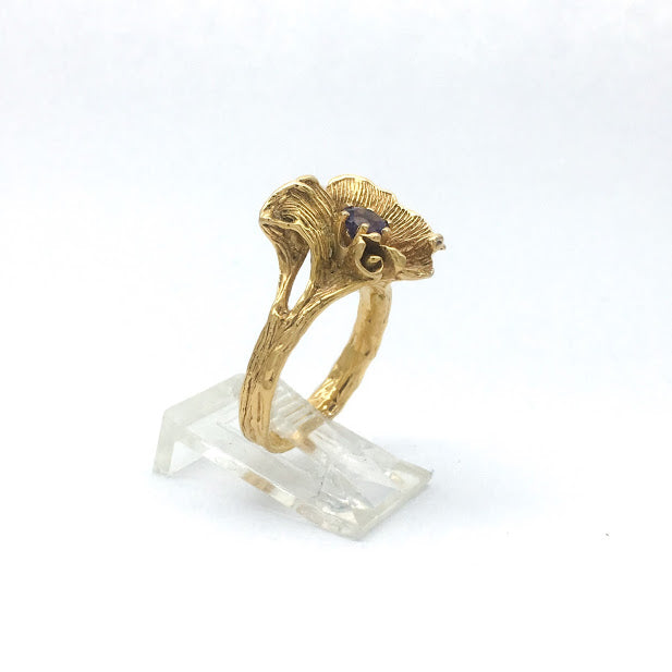 Blossom set with a tanzanite