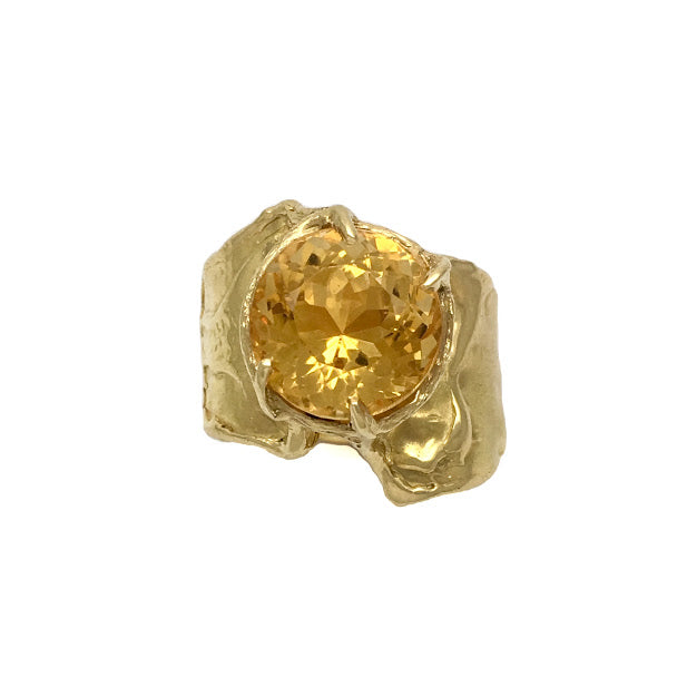 Fluid band rising up to support a round citrine
