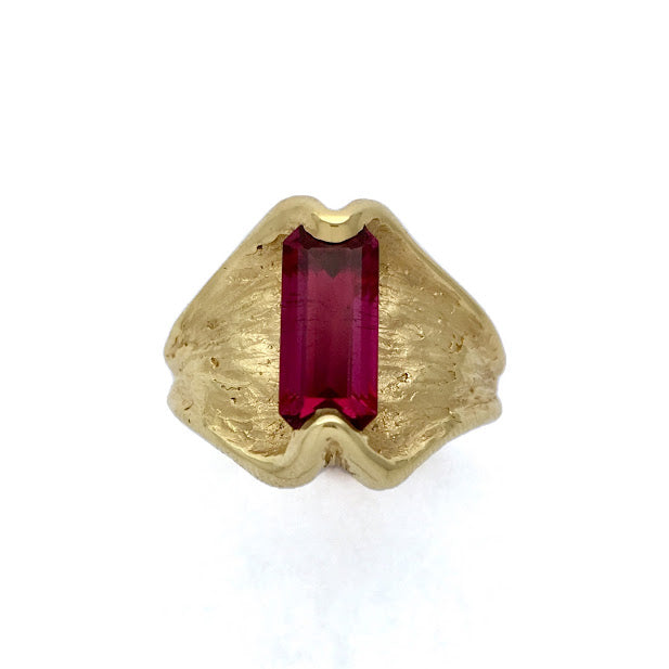 Inside out ring set with an emerald cut rubellite tourmaline