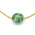 Green and white jade bead, the Chinese describe it as moss on snow jade
