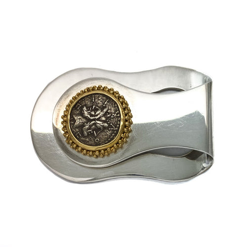 A genuine ancient Roman coin featuring the two faced god Janus set into a mock granulation bezel