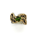 Gold lace over fluid silver band set with a green tourmaline