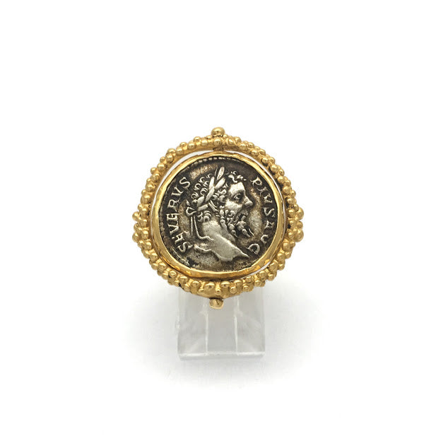 Caste granulation stirrup ring featuring an ancient Dentrius, Septimius Severus coin from 206 CE