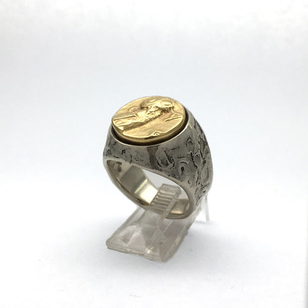 Athenian owl set into a pallet knife textured sterling band