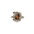 Blossom with a string of leaves around the band set with fancy brown orange diamond