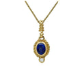 Sapphire and diamond set in caste granulation